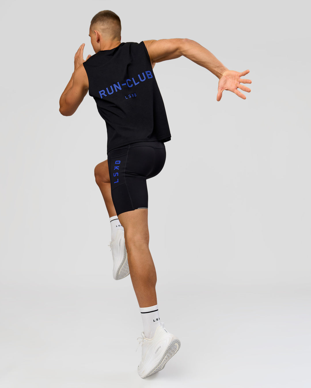 Man wearing Race Day 8" Short Tight - Black-Electric Indigo | Model:Albert | Size:M | - view 6
