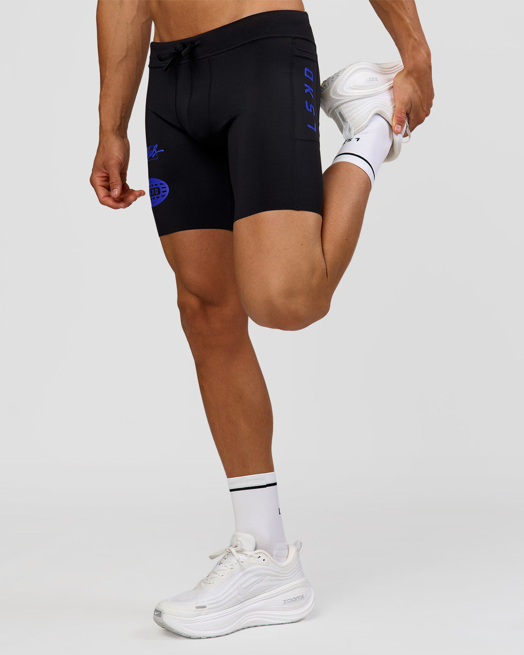 Man wearing Race Day 8" Short Tight - Black-Electric Indigo | Model:Albert | Size:M | - view 9
