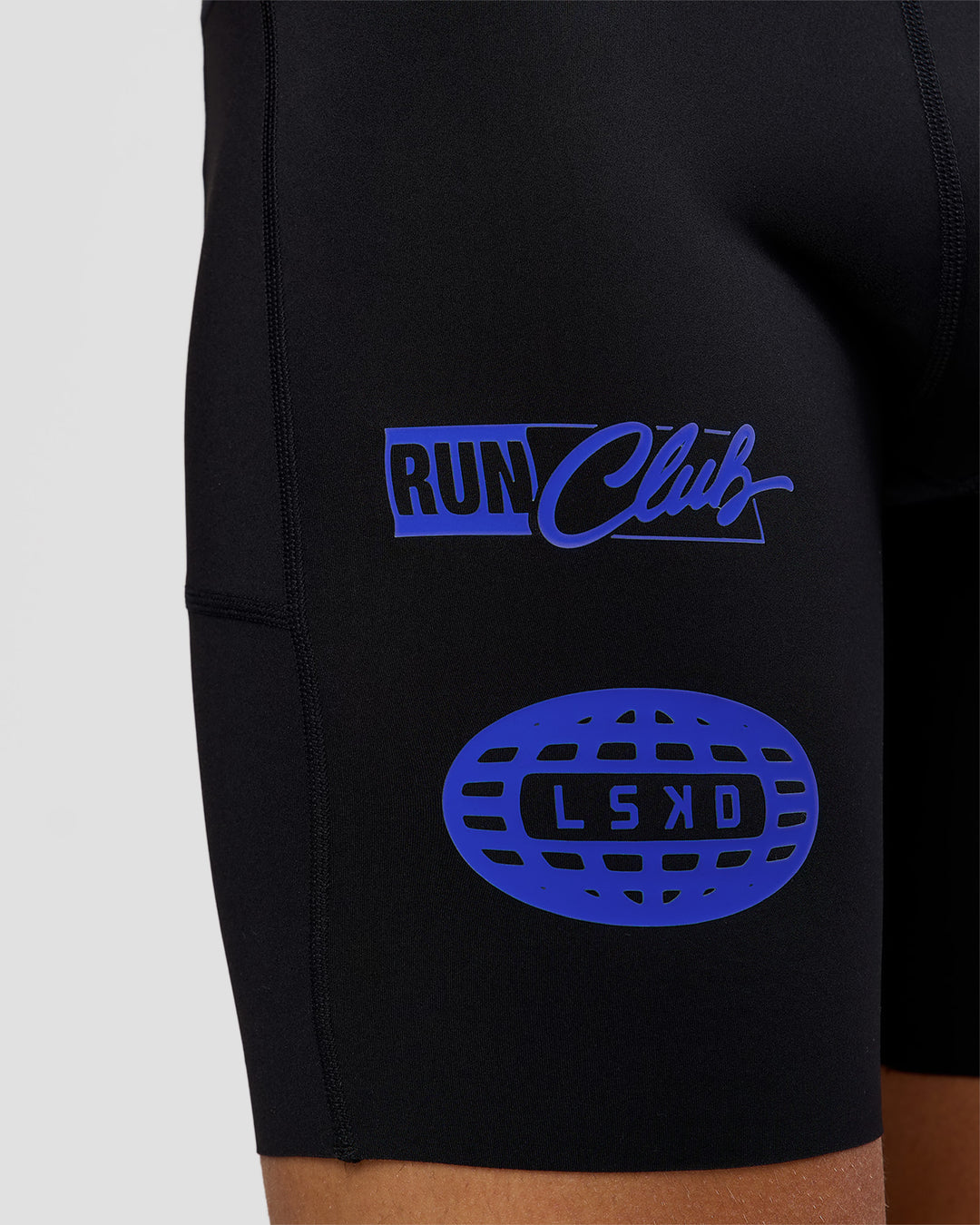 Man wearing Race Day 8" Short Tight - Black-Electric Indigo | Model:Albert | Size:M | - view 5