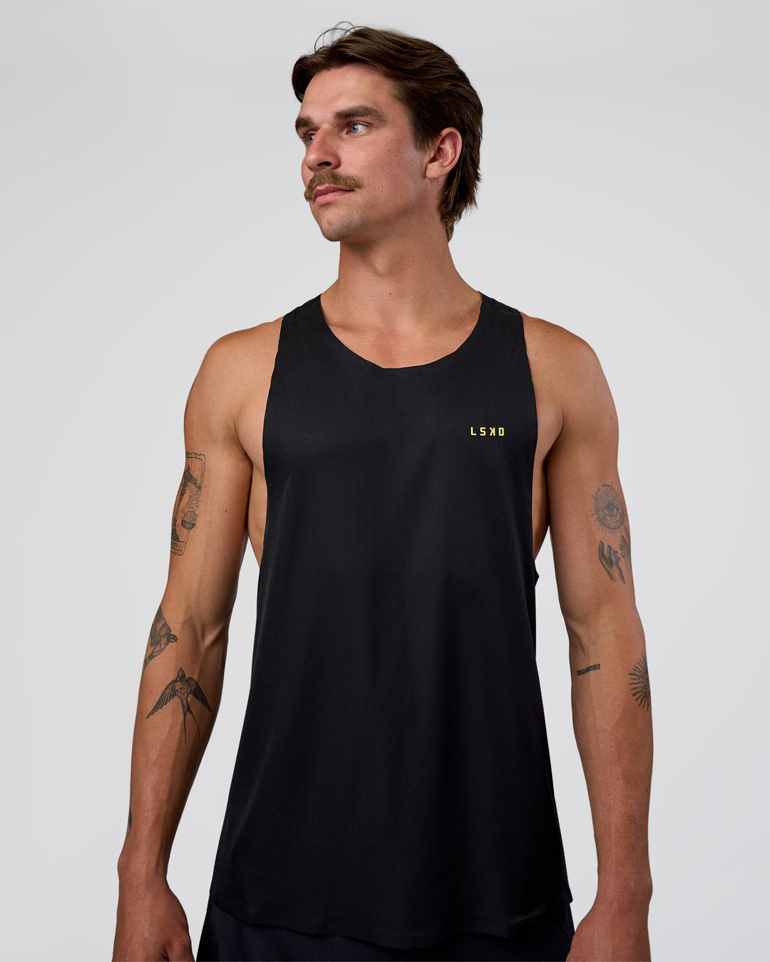 Man wearing Race Day Tank - Black-Yellow Fizz | Model:Konnor | Size:M - view 1