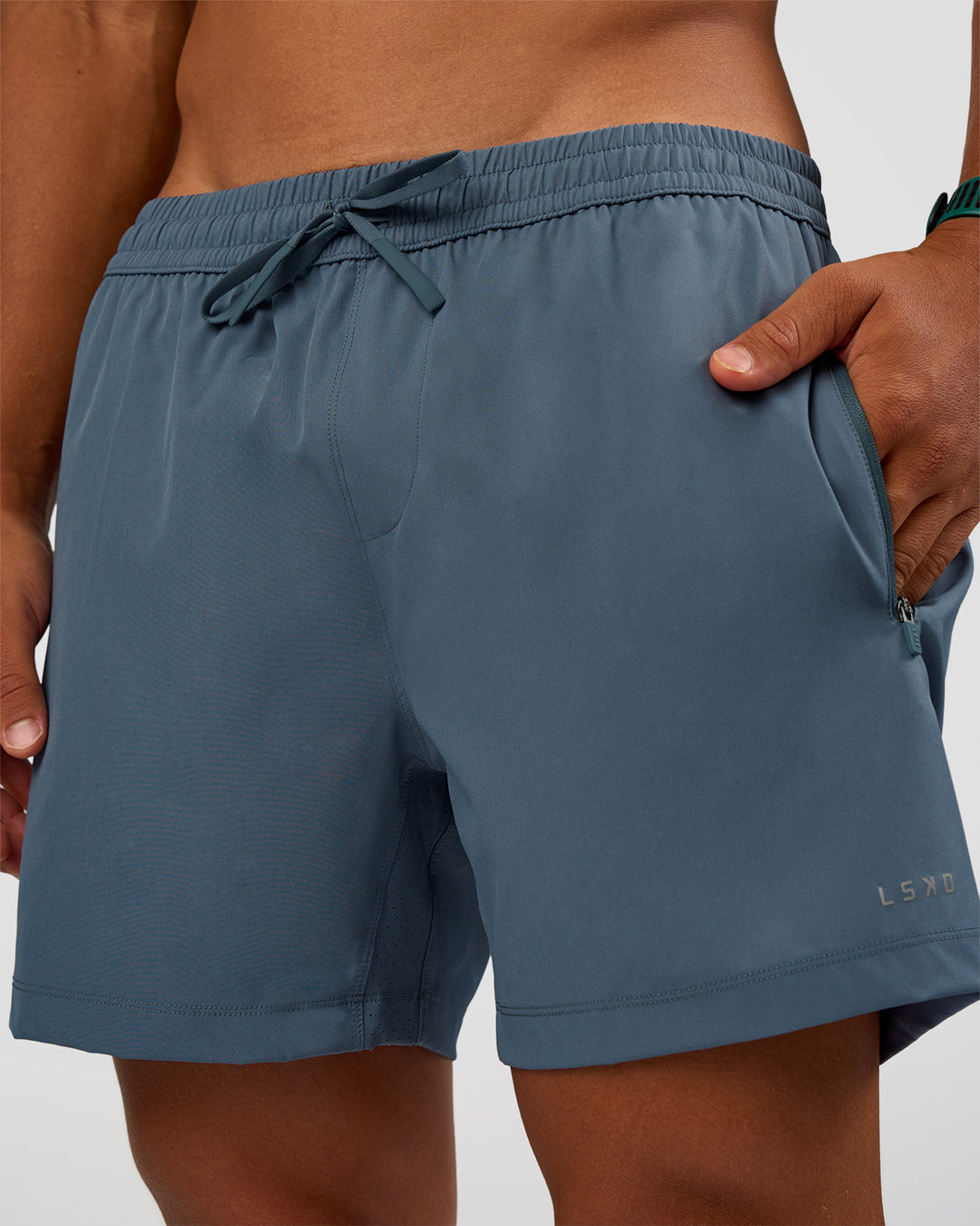 Man wearing Rep 5" Performance Short - Blue Mirage | Model:George | Size:M - view 2