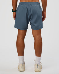 Man wearing Rep 5" Performance Short - Blue Mirage | Model:George | Size:M | Thumbnail Index: 3