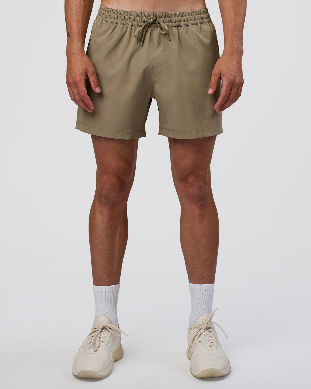 Man wearing Rep 5" Performance Short - Greige | Model:Konnor | Size:M - view 7