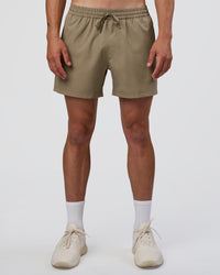 Man wearing Rep 5" Performance Short - Greige | Model:Konnor | Size:M | Thumbnail Index: 6