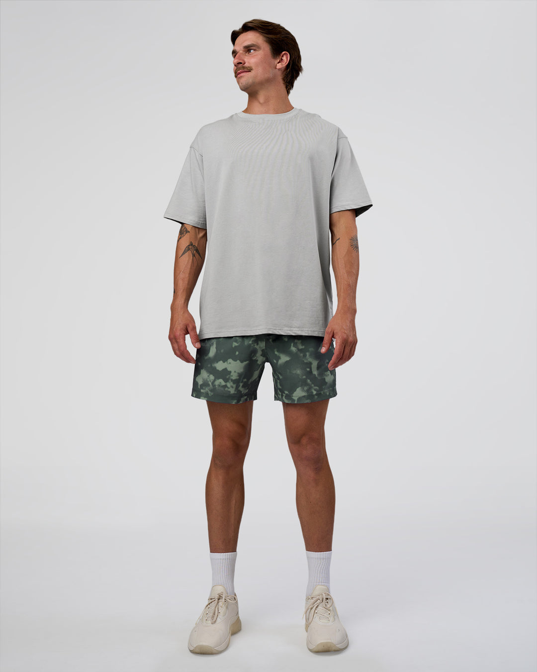 Man wearing Rep 5" Performance Short - Washed Camo Carbon | Model:Konnor | Size:M - view 7
