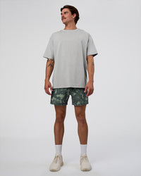 Man wearing Rep 5" Performance Short - Washed Camo Carbon | Model:Konnor | Size:M | Thumbnail Index: 6