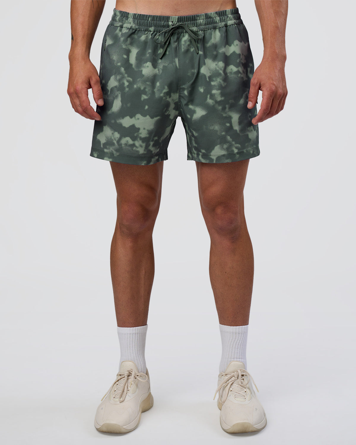 Man wearing Rep 5" Performance Short - Washed Camo Carbon | Model:Konnor | Size:M