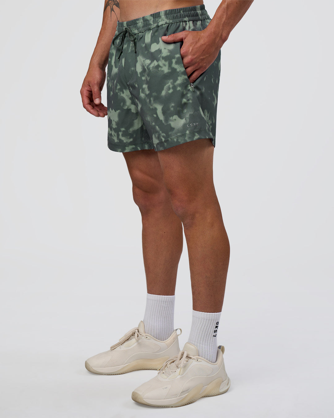 Man wearing Rep 5" Performance Short - Washed Camo Carbon | Model:Konnor | Size:M - view 6