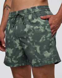 Man wearing Rep 5" Performance Short - Washed Camo Carbon | Model:Konnor | Size:M | Thumbnail Index: 1
