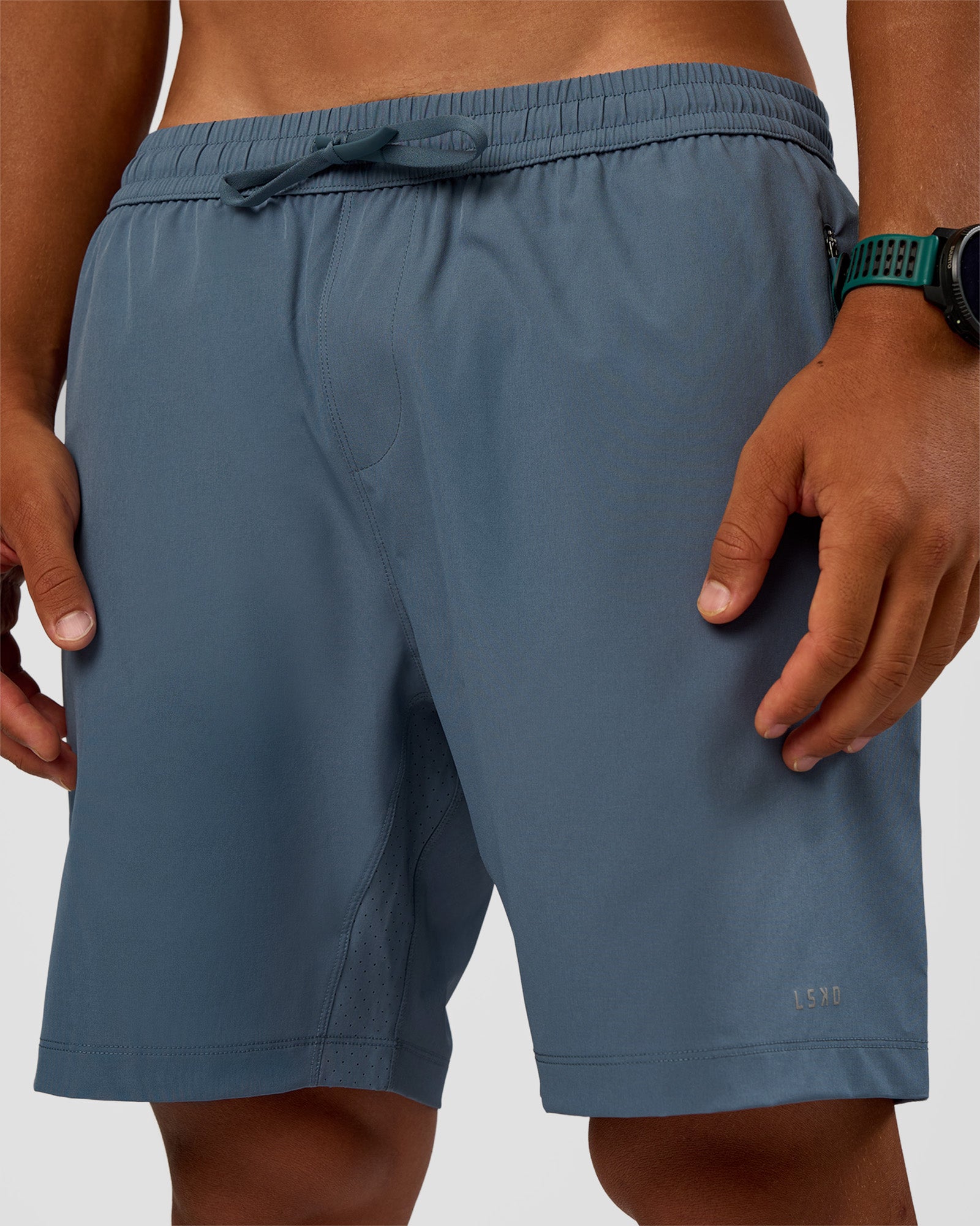 Man wearing Rep 7'' Performance Short - Blue Mirage | Model:George | Size:M