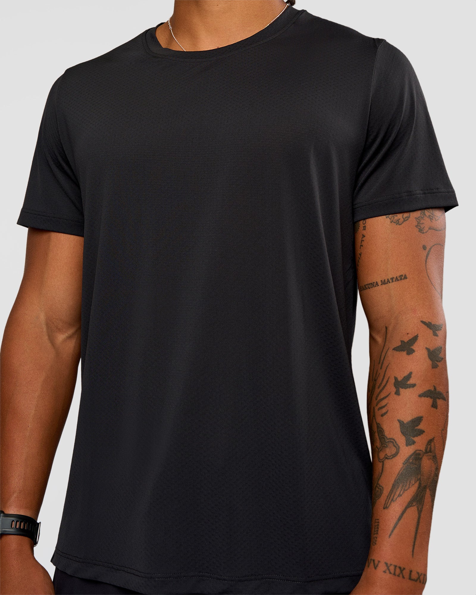 Man wearing Rep Training Tee - Black | Model:Malebo | Size:M