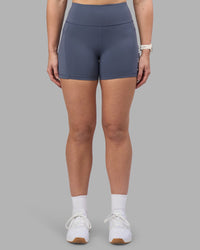 Woman wearing Rep Ultra High-Rise 4" Short Pockets - Night Shadow-White | Model:Amy | Size:M | Thumbnail Index: 2