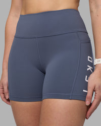 Woman wearing Rep Ultra High-Rise 4" Short Pockets - Night Shadow-White | Model:Amy | Size:M | Thumbnail Index: 5