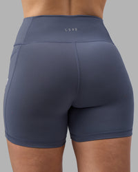 Woman wearing Rep Ultra High-Rise 4" Short Pockets - Night Shadow-White | Model:Amy | Size:M | Thumbnail Index: 7