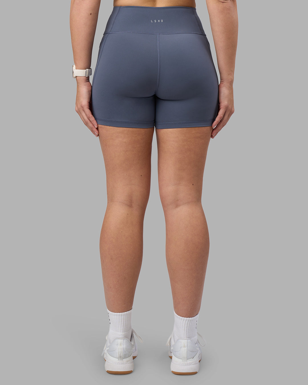 Woman wearing Rep Ultra High-Rise 4" Short Pockets - Night Shadow-White | Model:Amy | Size:M - view 4