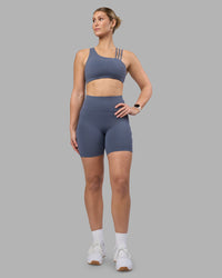 Woman wearing Rep Ultra High-Rise 6" Short Pockets - Night Shadow-White | Model:Amy | Size:M | Thumbnail Index: 4