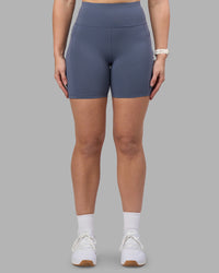 Woman wearing Rep Ultra High-Rise 6" Short Pockets - Night Shadow-White | Model:Amy | Size:M | Thumbnail Index: 6