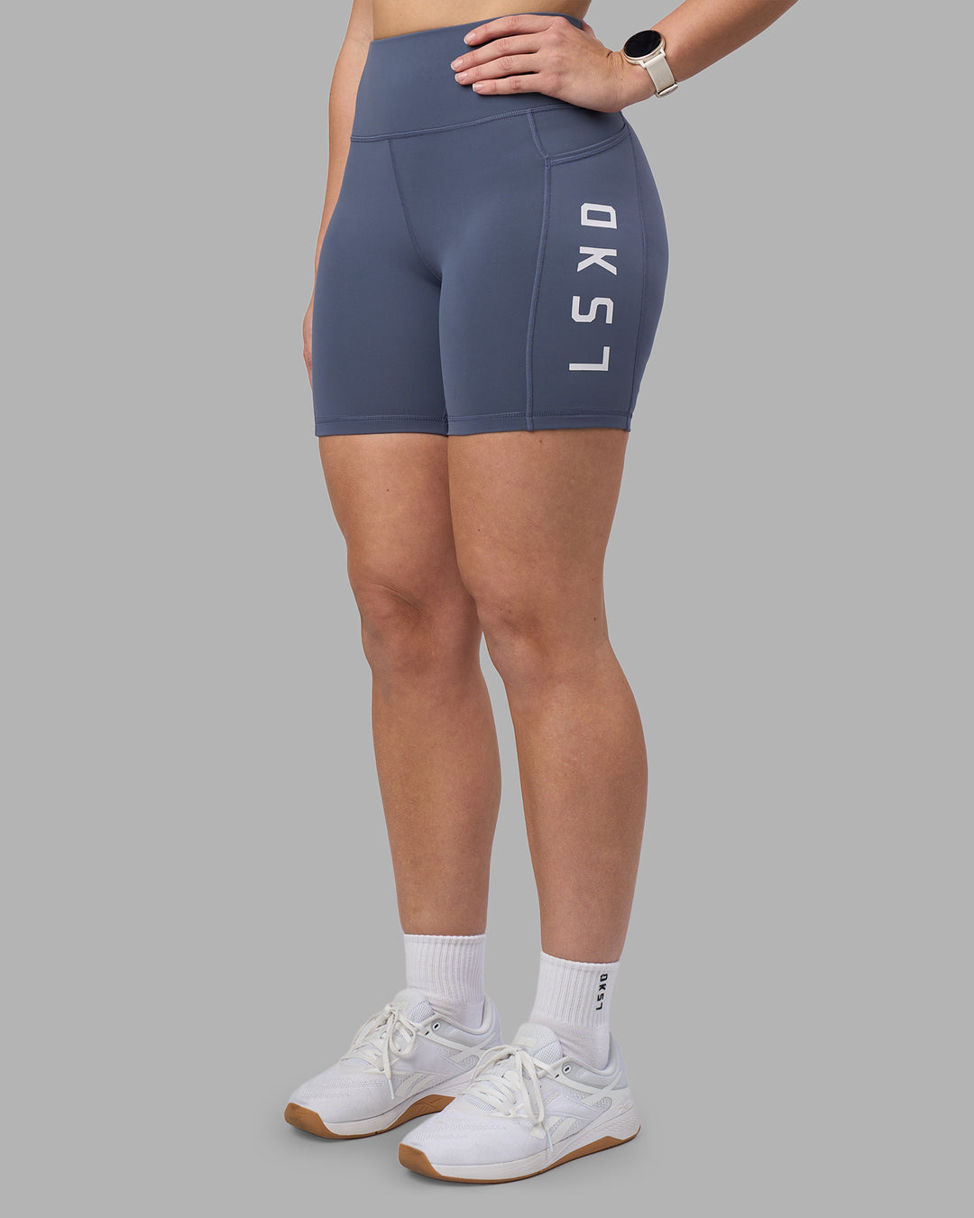 Woman wearing Rep Ultra High-Rise 6" Short Pockets - Night Shadow-White | Model:Amy | Size:M - view 3