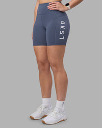 Woman wearing Rep Ultra High-Rise 6" Short Pockets - Night Shadow-White | Model:Amy | Size:M | Thumbnail Index: 2