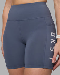 Woman wearing Rep Ultra High-Rise 6" Short Pockets - Night Shadow-White | Model:Amy | Size:M | Thumbnail Index: 1