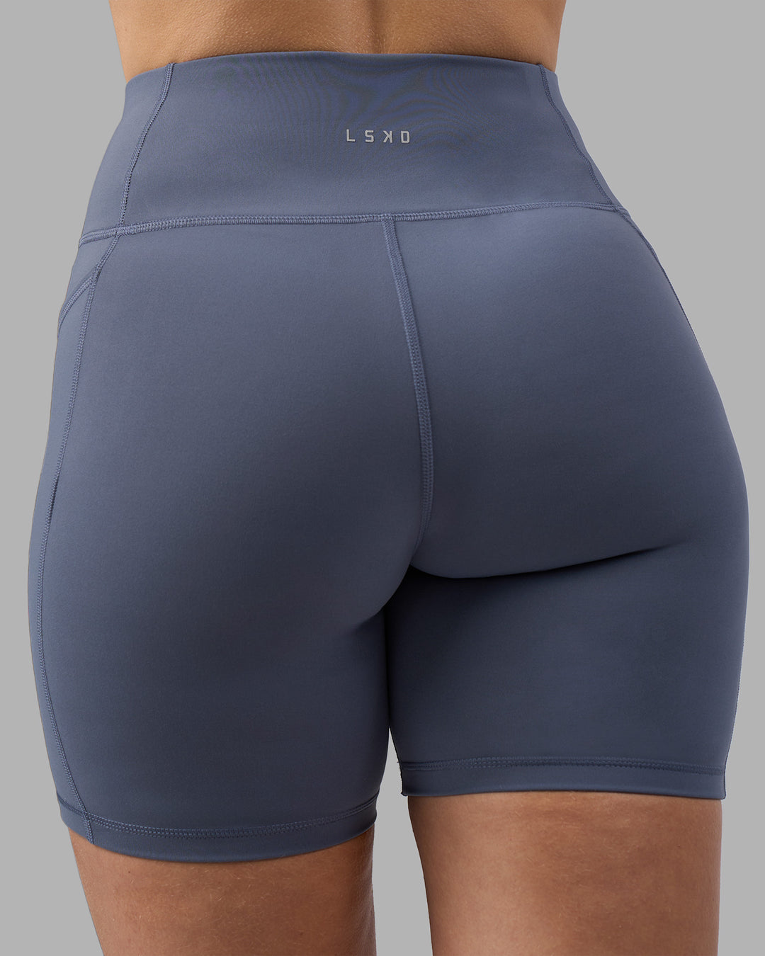 Woman wearing Rep Ultra High-Rise 6" Short Pockets - Night Shadow-White | Model:Amy | Size:M - view 4