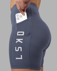 Woman wearing Rep Ultra High-Rise 6" Short Pockets - Night Shadow-White | Model:Amy | Size:M | Thumbnail Index: 5