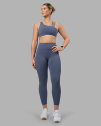 Woman wearing Rep Ultra High-Rise 7/8 Legging Pockets - Night Shadow-White | Model:Amy | Size:M | Thumbnail Index: 1
