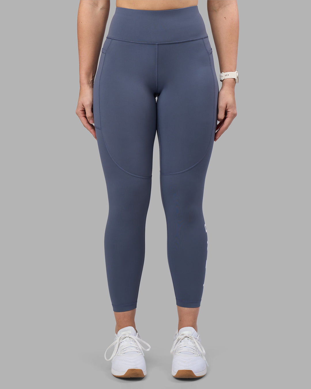 Woman wearing Rep Ultra High-Rise 7/8 Legging Pockets - Night Shadow-White | Model:Amy | Size:M - view 6
