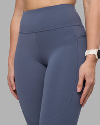 Woman wearing Rep Ultra High-Rise 7/8 Legging Pockets - Night Shadow-White | Model:Amy | Size:M | Thumbnail Index: 2