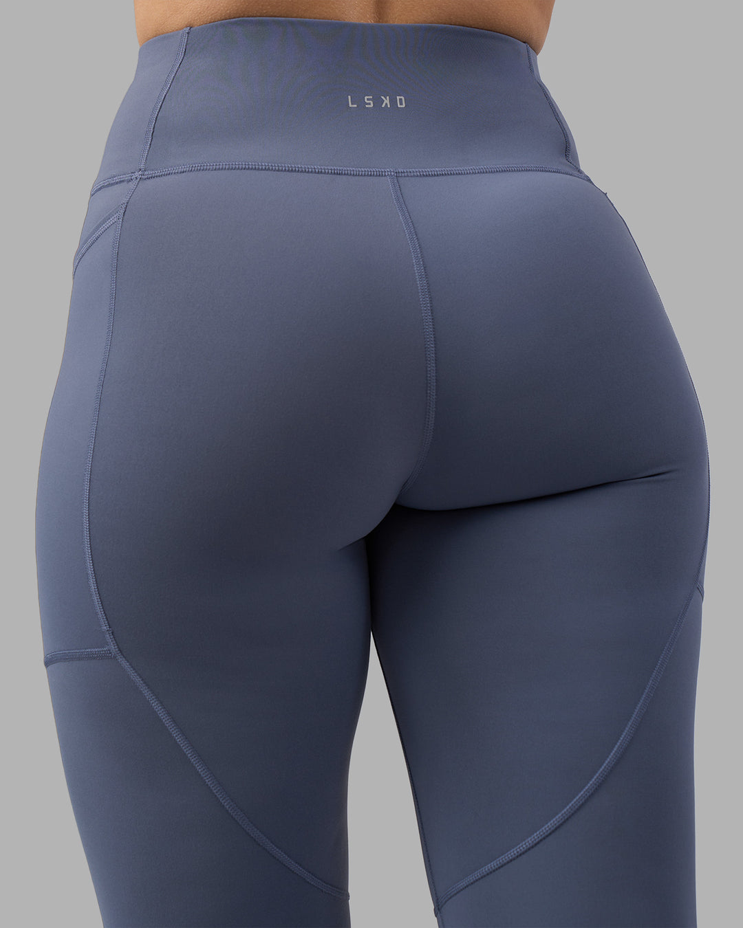Woman wearing Rep Ultra High-Rise 7/8 Legging Pockets - Night Shadow-White | Model:Amy | Size:M - view 7