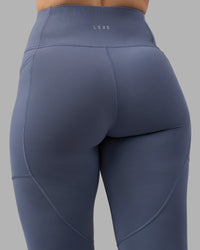 Woman wearing Rep Ultra High-Rise 7/8 Legging Pockets - Night Shadow-White | Model:Amy | Size:M | Thumbnail Index: 6
