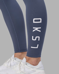 Woman wearing Rep Ultra High-Rise Full Length Legging Pockets - Night Shadow-White | Model:Amy | Size:M | Thumbnail Index: 1