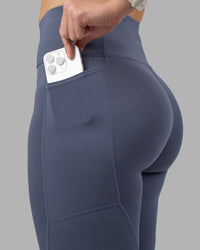 Woman wearing Rep Ultra High-Rise Full Length Legging Pockets - Night Shadow-White | Model:Amy | Size:M | Thumbnail Index: 2