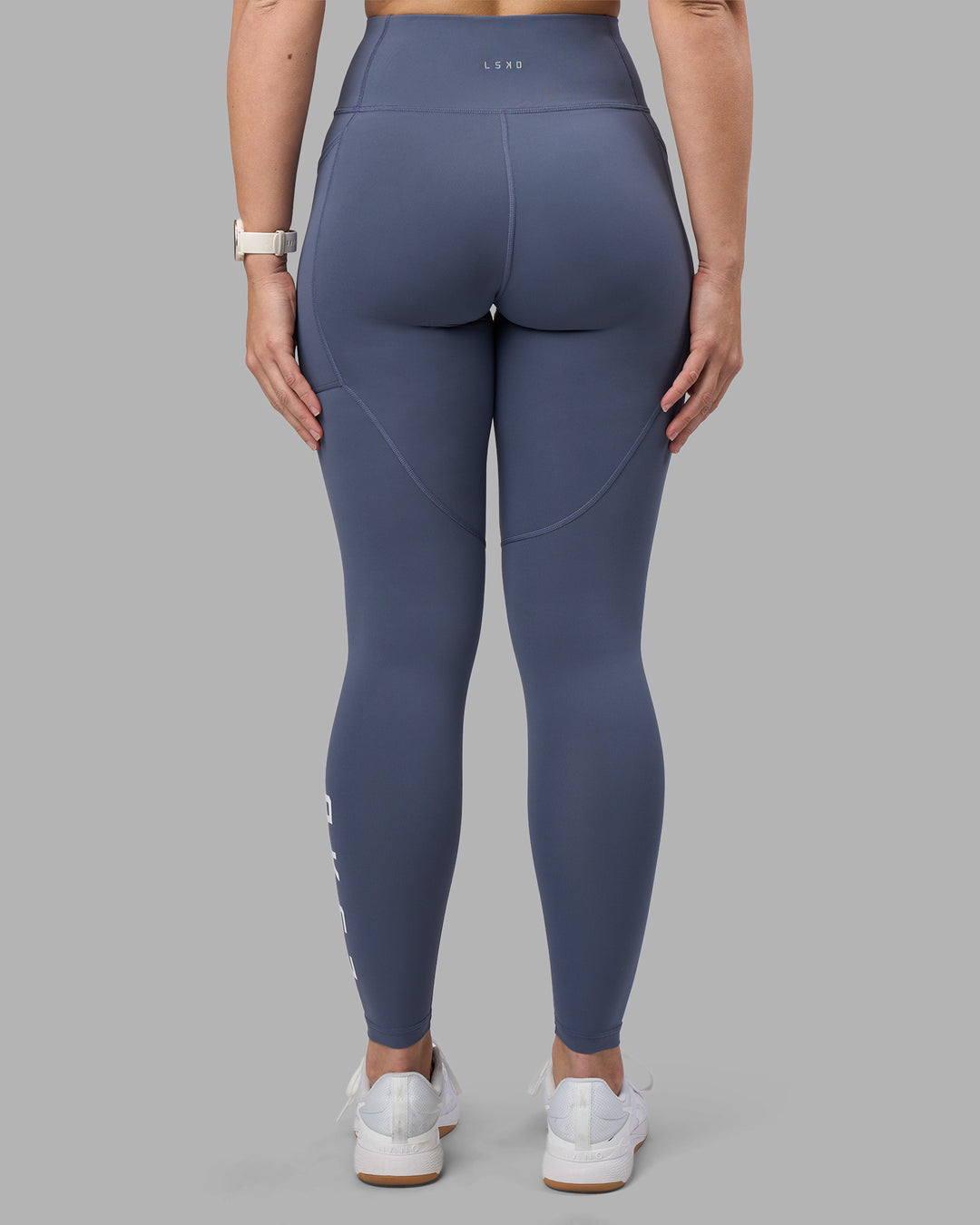 Woman wearing Rep Ultra High-Rise Full Length Legging Pockets - Night Shadow-White | Model:Amy | Size:M - view 4