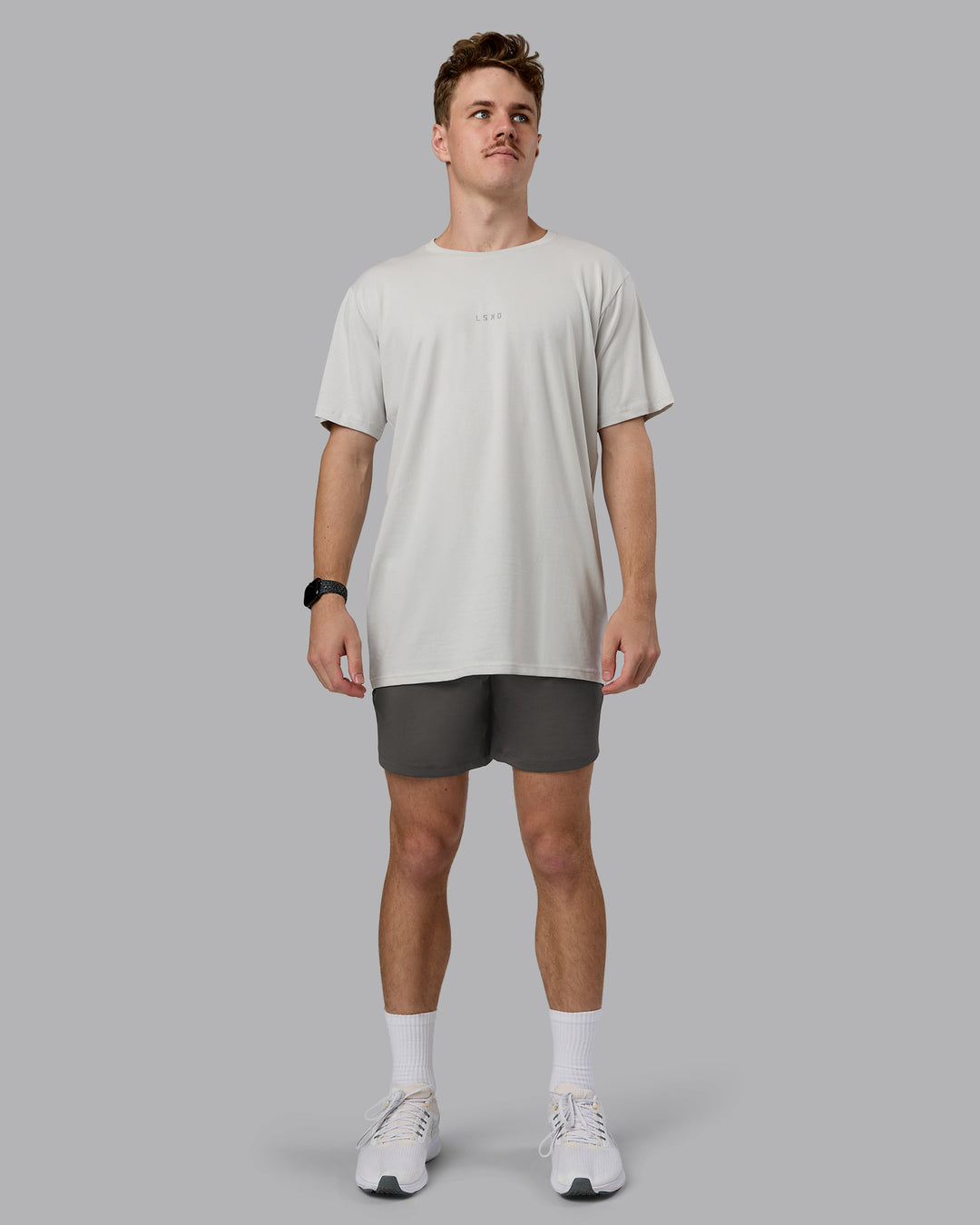 Man wearing Restore CloudFLX Short - Dark Storm | Model:Cameron | Size:M - view 3