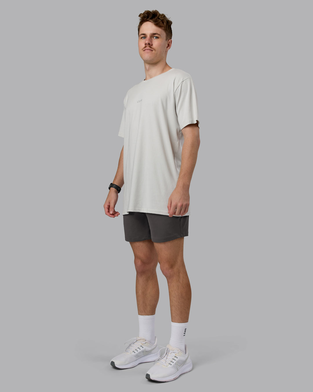 Man wearing Restore CloudFLX Short - Dark Storm | Model:Cameron | Size:M - view 7