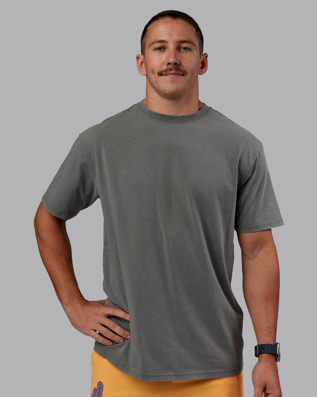 Man wearing Rise &amp; Lift Washed FLXCotton Oversized Tee - Graphite-Purple Opulence | Model:Jaiden | Size:M - view 5