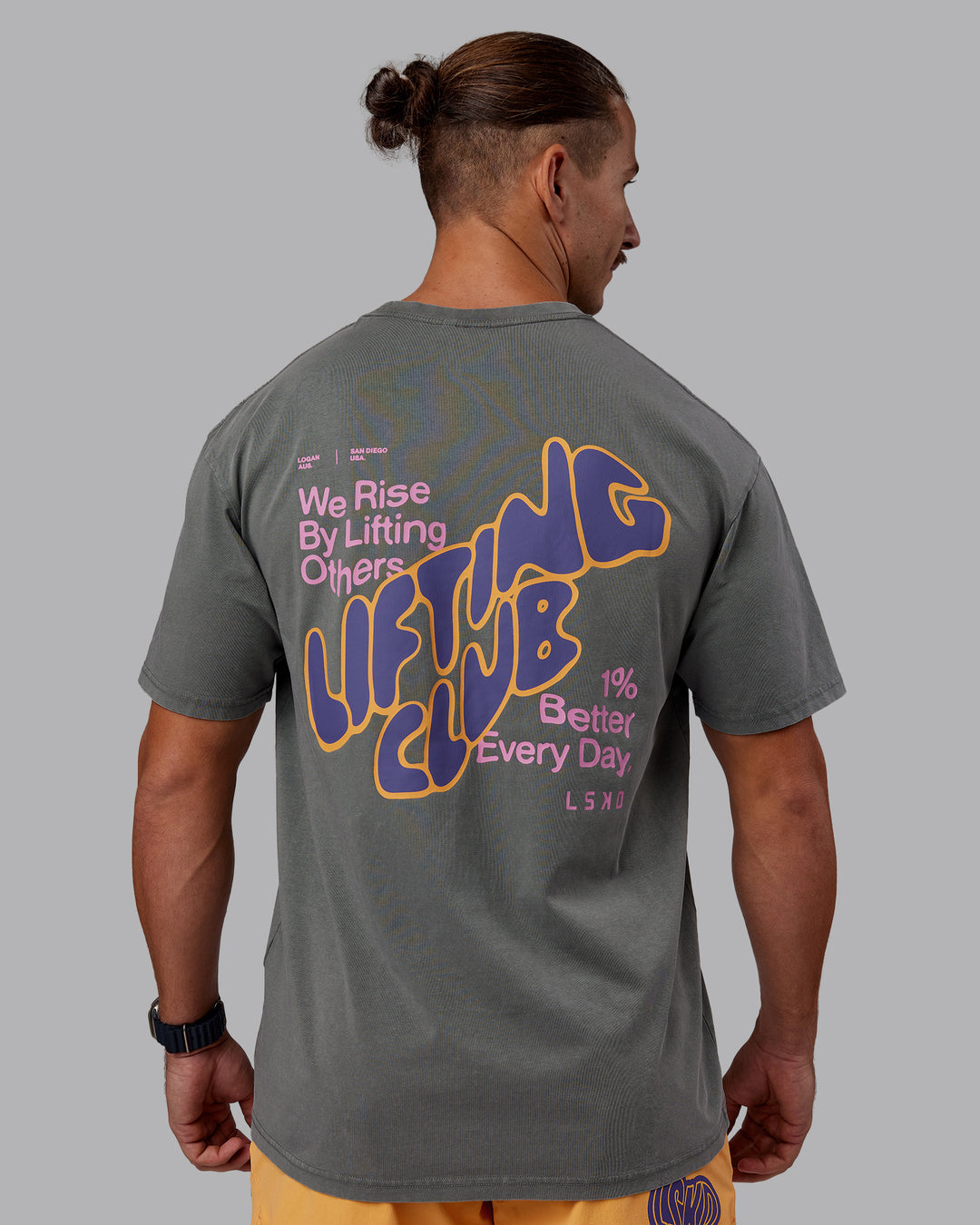 Man wearing Rise &amp; Lift Washed FLXCotton Oversized Tee - Graphite-Purple Opulence | Model:Jaiden | Size:M - view 10