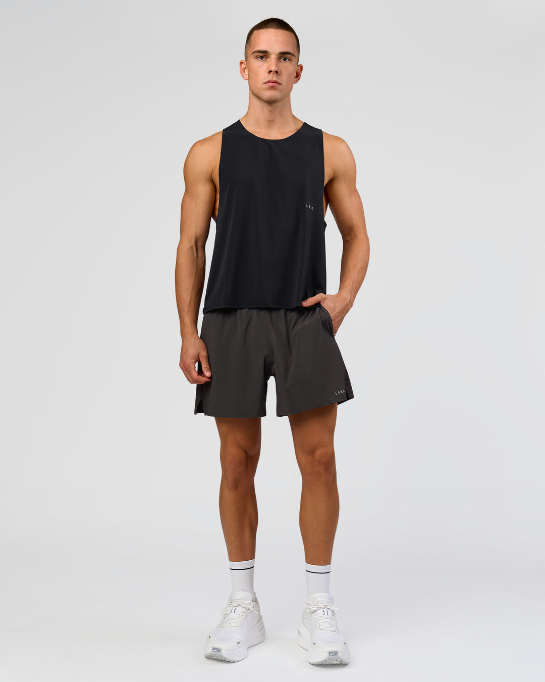 Man wearing Run Club Elevate Pace Running Tank - Black-Onyx | Model:Albert | Size:M - view 4