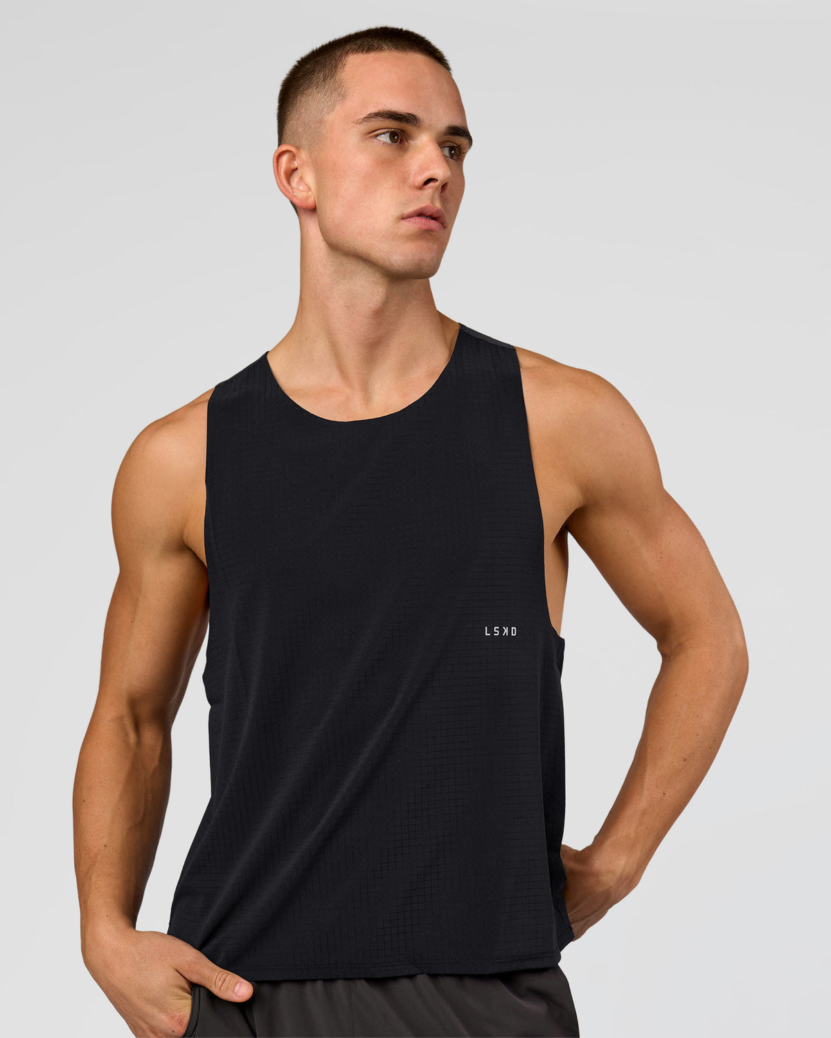 Man wearing Run Club Elevate Pace Running Tank - Black-Onyx | Model:Albert | Size:M