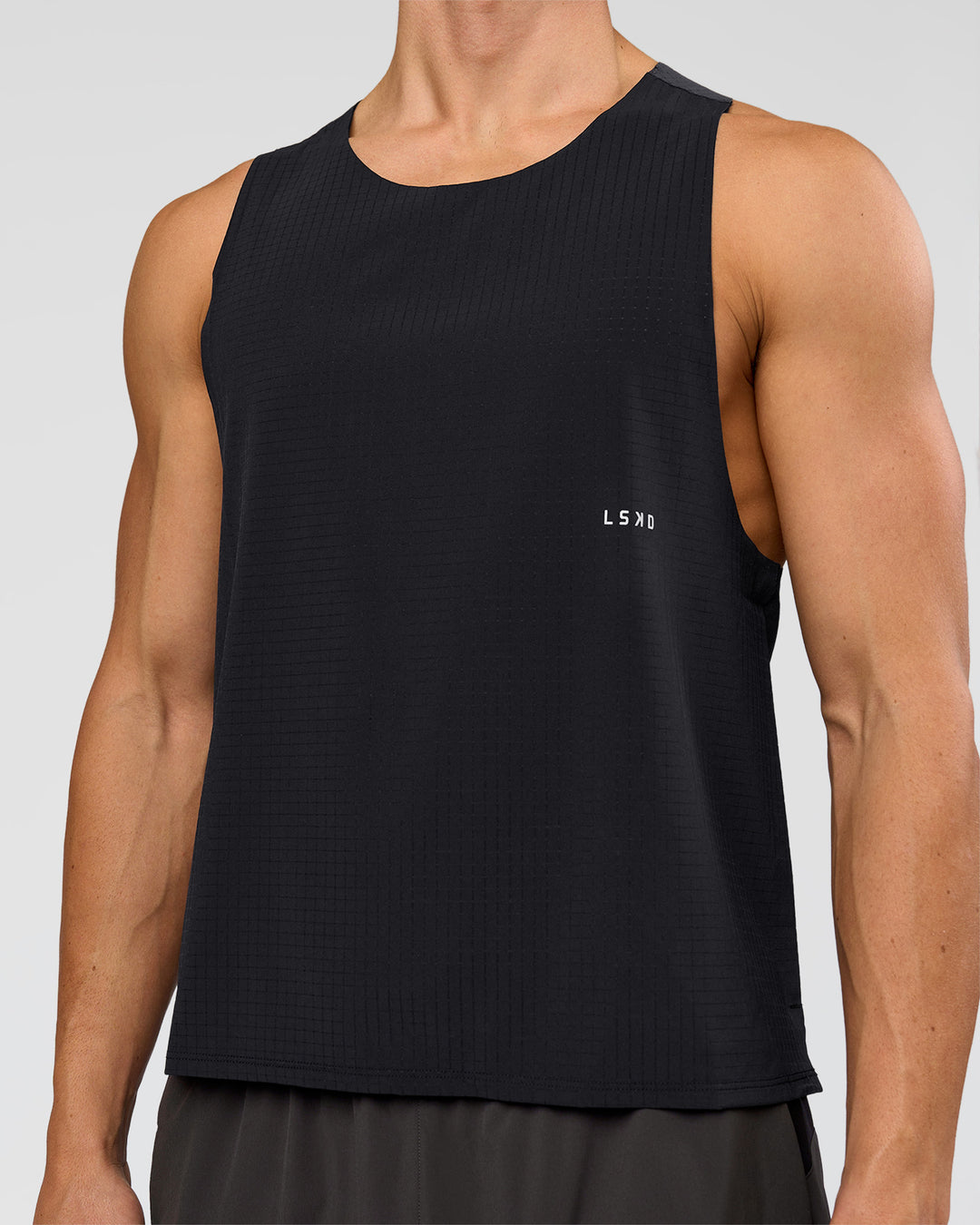 Man wearing Run Club Elevate Pace Running Tank - Black-Onyx | Model:Albert | Size:M - view 6