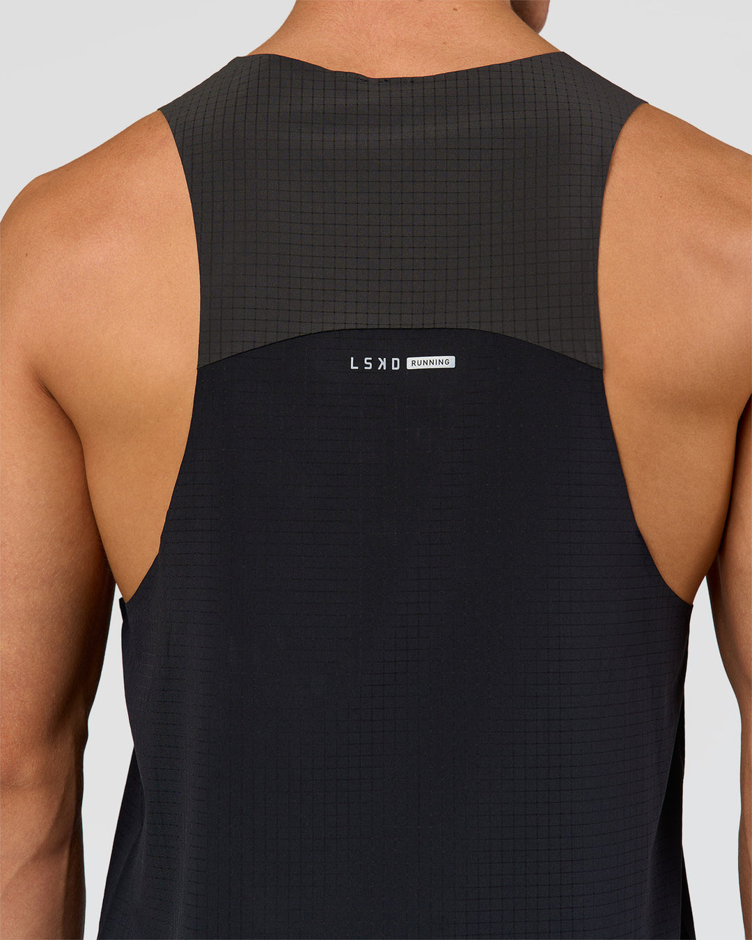 Man wearing Run Club Elevate Pace Running Tank - Black-Onyx | Model:Albert | Size:M - view 2