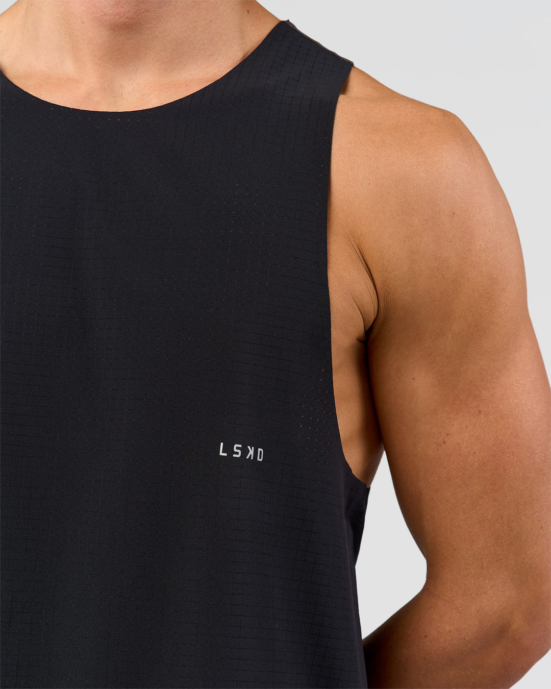 Man wearing Run Club Elevate Pace Running Tank - Black-Onyx | Model:Albert | Size:M - view 9