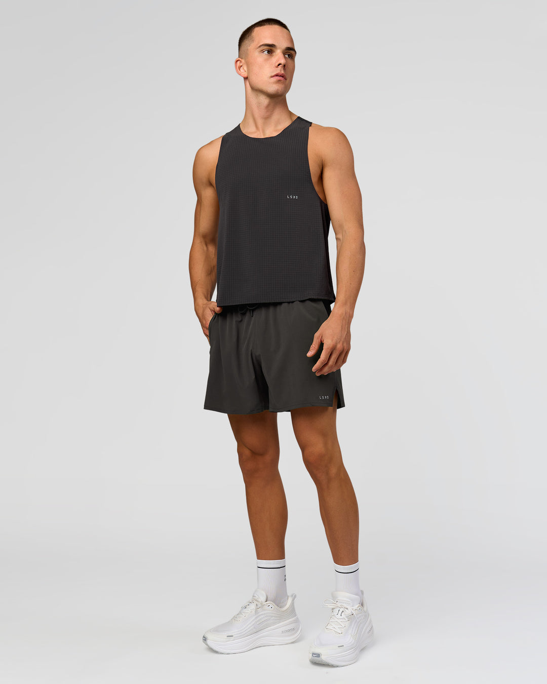 Man wearing Run Club Elevate Pace Running Tank - Onyx-Black | Model:Albert | Size:M - view 5