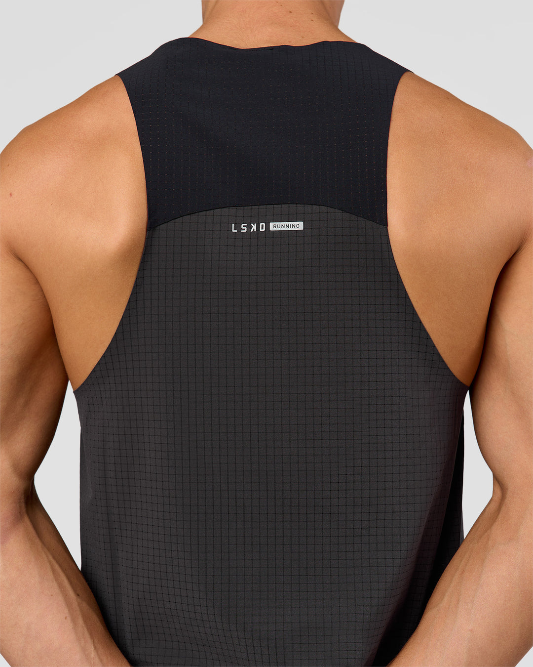 Man wearing Run Club Elevate Pace Running Tank - Onyx-Black | Model:Albert | Size:M - view 7