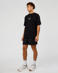 Man wearing Run Club Script FLXCotton Oversized Tee - Black-Alloy | Model:Leandro | Size:M | Thumbnail Index: 8