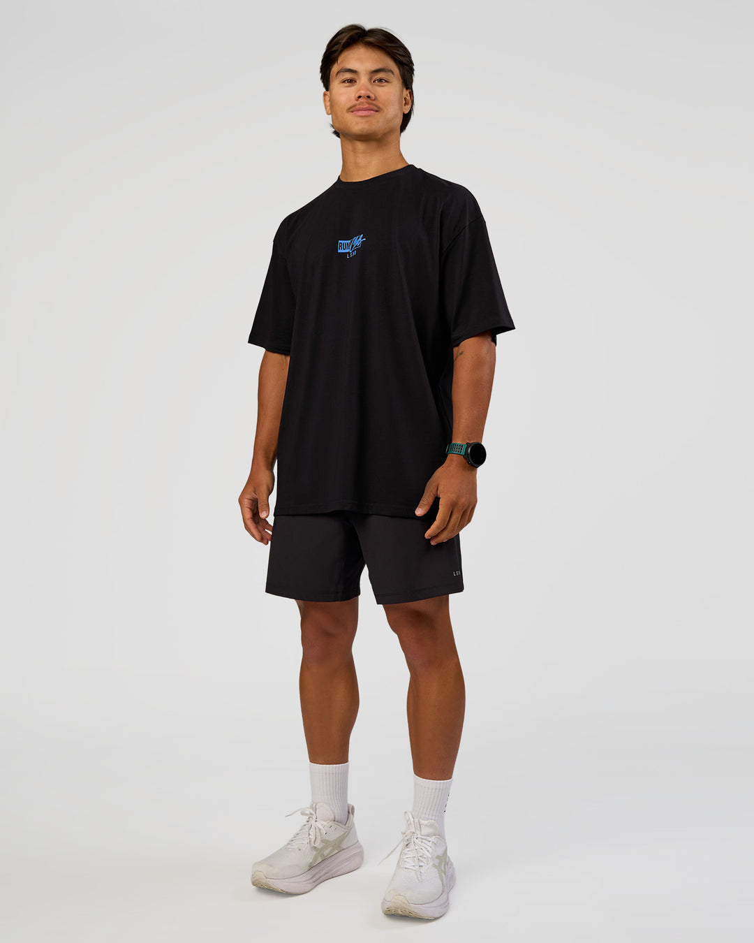 Man wearing Run Club Script FLXCotton Oversized Tee - Black-Palace Blue | Model:George | Size:M - view 7