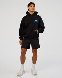 Man wearing Run Club Script Oversized Hoodie - Black-Palace Blue | Model:George | Size:M | Thumbnail Index: 11