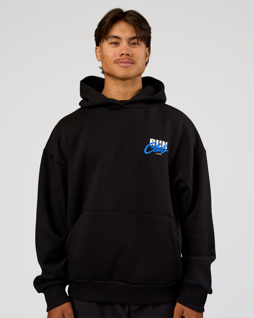 Man wearing Run Club Script Oversized Hoodie - Black-Palace Blue | Model:George | Size:M - view 3