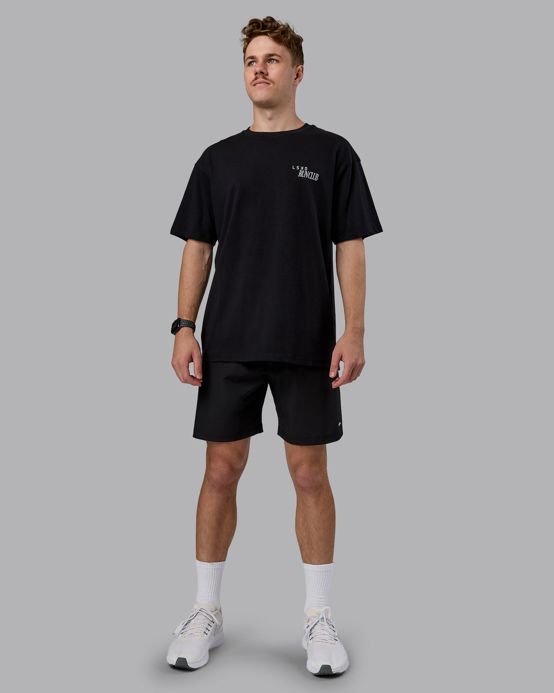 Man wearing Run Love FLXCotton Oversized Tee - Black-Reflective | Model:Cameron | Size:M - view 11